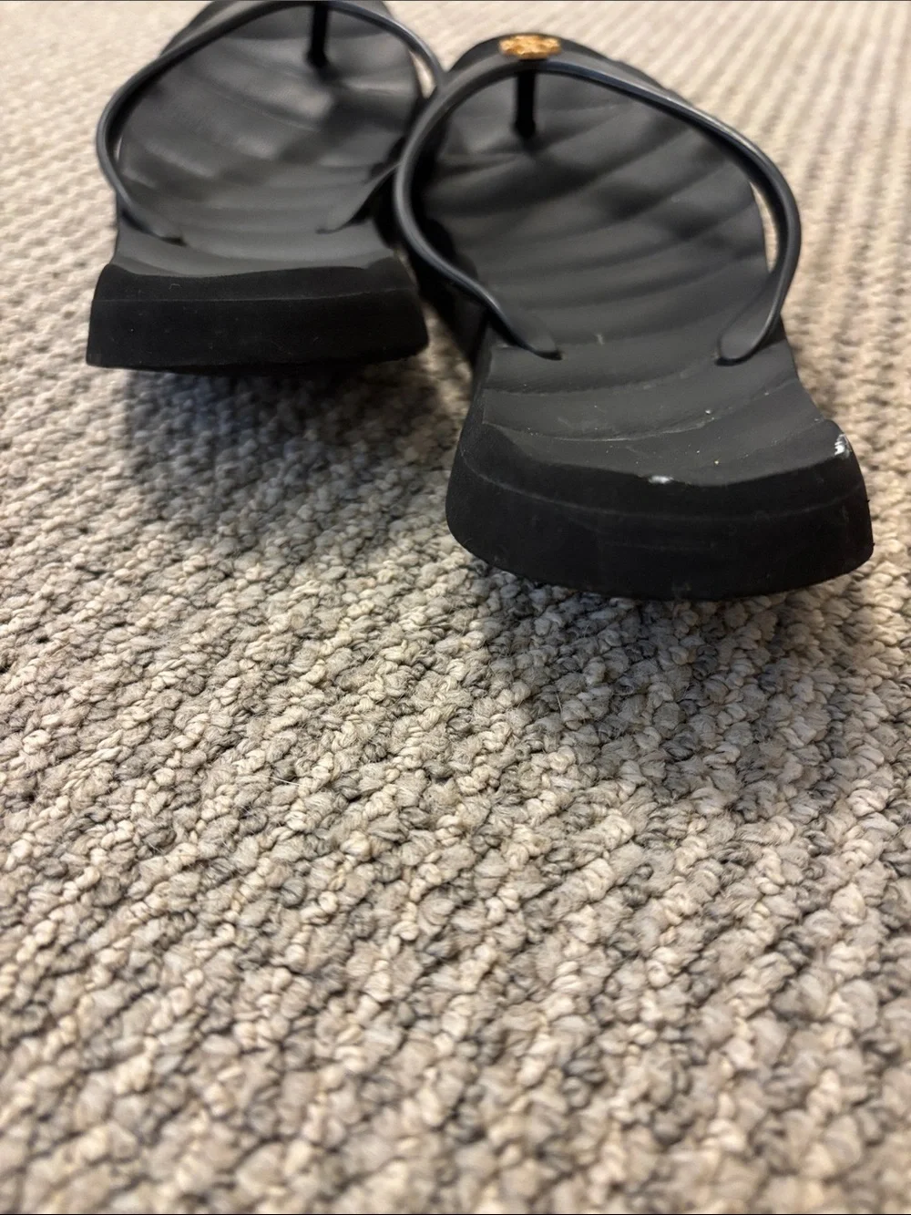 Tory Burch Black Flip Flops with Gold Logo Accent